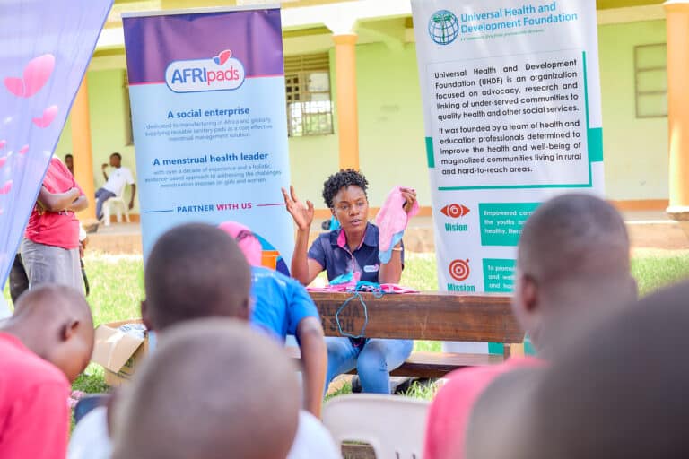 A lady sensitizing people on menstrual health